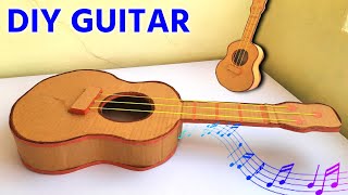 how to make guitar  how to make guitar from cardboard  diy functional rubberband toy making [upl. by Nosrettap]